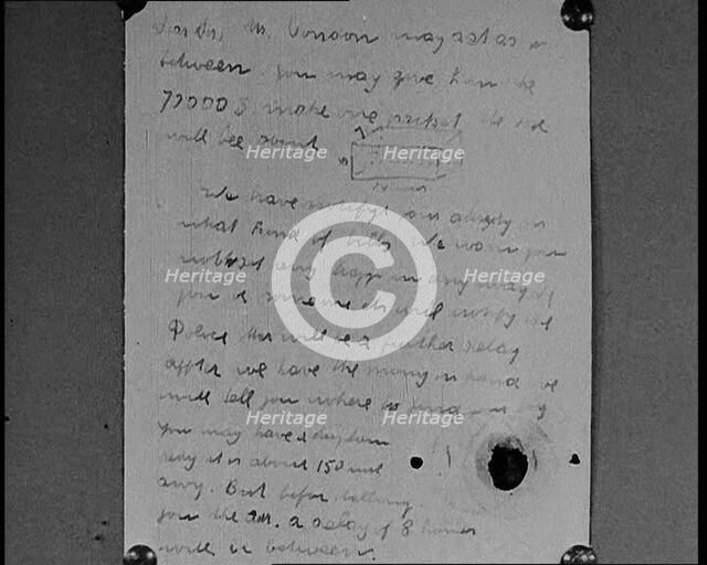 Notes of Ransom Being Shown as Articles of Evidence in the Lindbergh's Kidnapping Case Trial, 1930s. Creator: British Pathe Ltd.