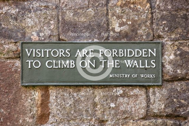 Notice on the wall of Lanercost Priory, Cumbria, 2018. Creator: Alun Bull.
