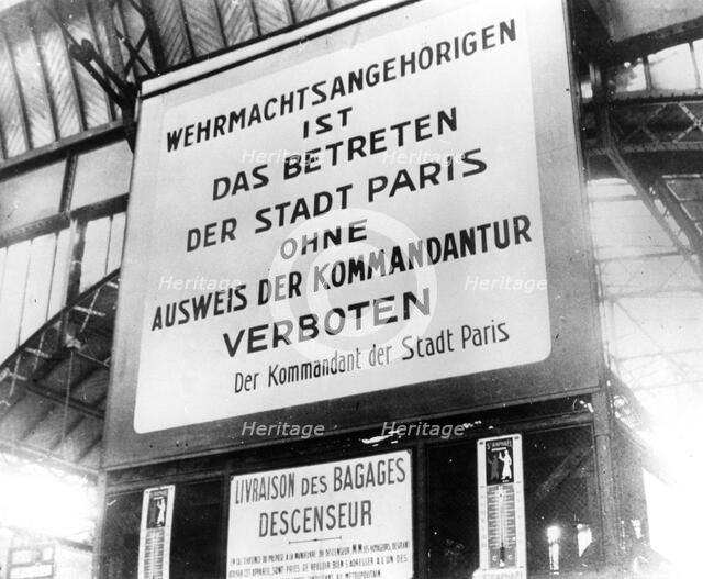Notice in a railway station in German-occupied Paris, 17 July 1940. Artist: Unknown
