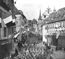 Notre entrée a Colmar; Le defile des troupes francaises dans les rues...22 novembre 1918. Creator: Unknown