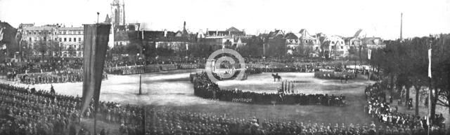 'Notre entrée a Colmar; trois photographies format panorama de la reception du general..., 1918. Creator: Unknown.