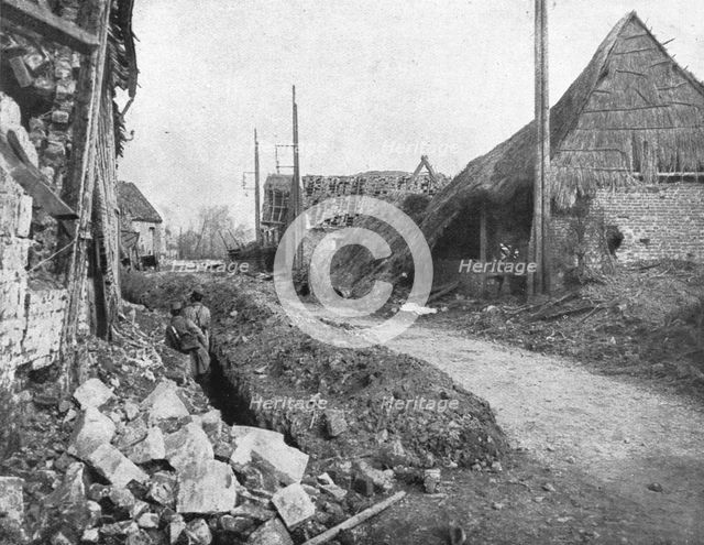 ''Notre offensive d'Artois; La rue principale d'Ablain-Saint-Nazaire', 1915. Creator: Unknown.