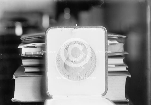 Nobel Peace Prize - The Medal, 1913. Creator: Harris & Ewing.
