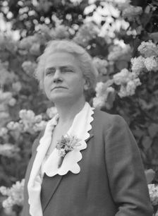 Noland, Charlotte, Miss, standing outdoors, 1931 May 8. Creator: Arnold Genthe