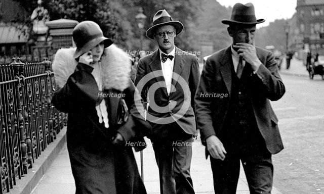 Nora Barnacle (left), James Joyce (center) and their solicitor n London on the day of their marriage