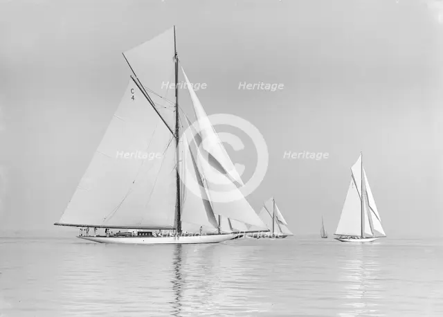 'Norada', 'Britannia' & 'Maudrey' sailing in gentle winds, 1913. Creator: Kirk & Sons of Cowes.