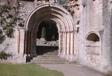 Norman Arch leading to cloisters, Dryburgh Abbey, Berwick-shire, Scotland, 20th century. Artist: CM Dixon