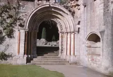 Norman Arch leading to cloisters, Dryburgh Abbey, Berwick-shire, Scotland, 20th century. Artist: CM Dixon
