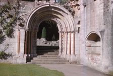 Norman Arch leading to cloisters, Dryburgh Abbey, Berwick-shire, Scotland, 20th century. Artist: CM Dixon