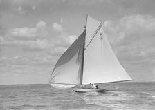 Norman (H1), an early 8 Metre class yacht sailing downwind, 1911. Creator: Kirk & Sons of Cowes