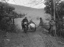 Norton and sidecar ridden by SL Grubb competing in the Inter-Varsity Trial, November 1931. Artist: Bill Brunell