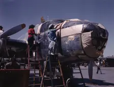 North American B-25 bomber is prepared...North American Aviation, Inc., Inglewood, Calif., 1942. Creator: Alfred T Palmer