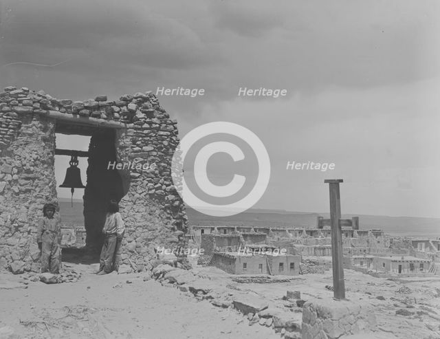 North American Indian children on roof of San Estevan Mission, Acoma Pueblo, New Mexico, c1899-c1928 Creator: Arnold Genthe.