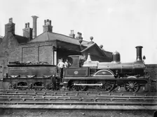 North Staffordshire Railway steam Locomotive No 14 and its tender c1875 Creator: Unknown