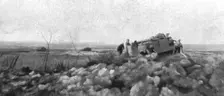 Nos chars d'assaut; Un char arreté par une avarie, pendant le combat,au passage de la..., 1917. Creator: Unknown