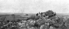 Nos chars d'assaut; Un char arreté par une avarie, pendant le combat,au passage de la..., 1917. Creator: Unknown