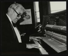 Nat Pierce at the piano, London, 1984. Creator: Denis Williams