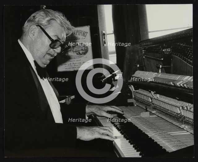 Nat Pierce at the piano, London, 1984. Creator: Denis Williams.