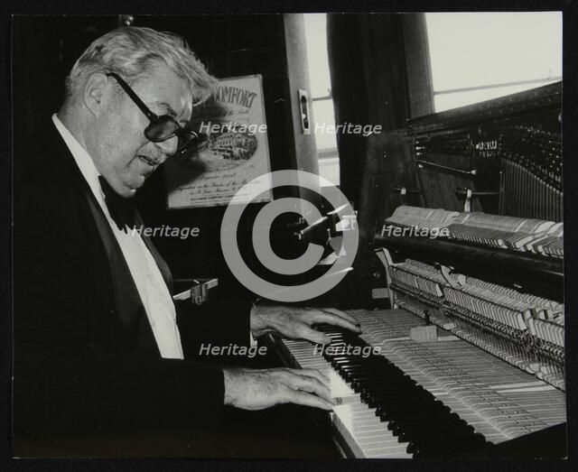 Nat Pierce at the piano, London, 1984. Artist: Denis Williams