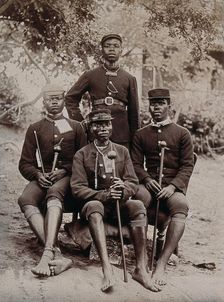 Natal, South Africa: four African policemen in uniform, 1896. Creator: Unknown