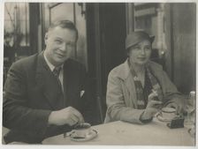 Natalia Goncharova and Mikhail Larionov at the Restaurant Petit Saint-Benoît, 1932. Creator: Anonymous