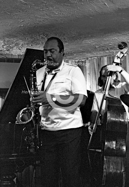 Nathan Davis and Peter Ind, Bass Clef, Hoxton Square, London, August 1987.   Artist: Brian O'Connor.