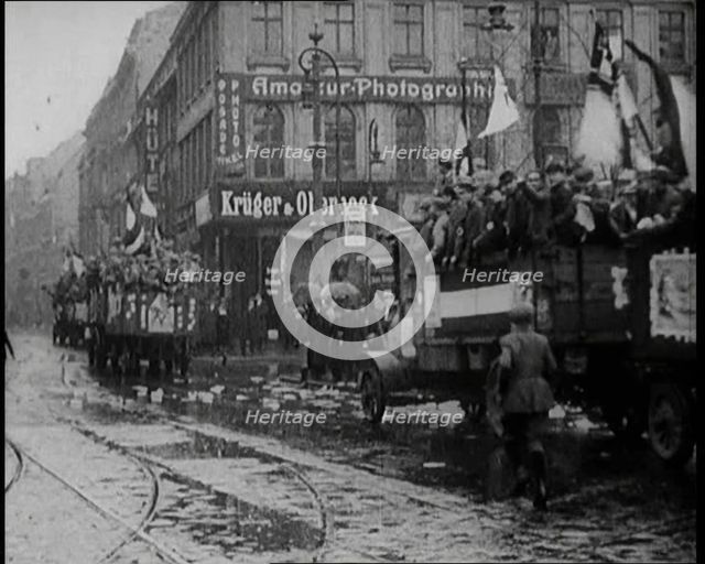 National Socialist (Nazi) Party Campaigning in Germany Scattering Pamphlets from  Trucks..., 1926. Creator: British Pathe Ltd.