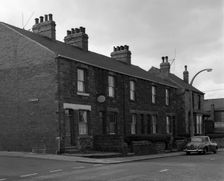 National Provincial Bank located in a terraced house, Goldthope, South Yorkshire, 1963. Artist: Michael Walters