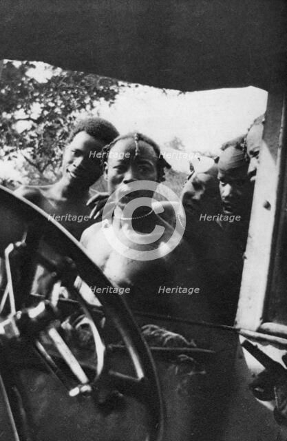 Native men seeing a white woman for the first time, Mongalla to Terrakekka, Sudan, 1925 (1927). Artist: Thomas A Glover