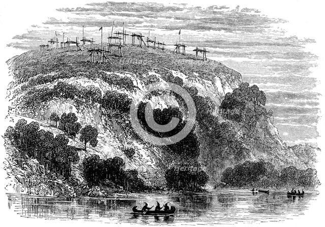 Native North American burial ground, showing the dead on raised platforms, 1876. Artist: Unknown