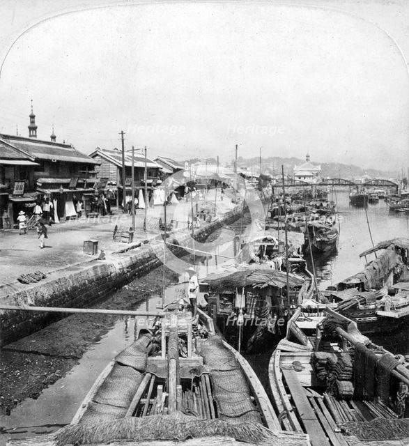 Native boats on a waterway in Yokohama, Japan, 1901.Artist: Clarence H White