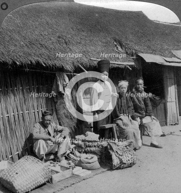 Native shop and customers, near Mogok, northern Burma, c1900s(?).Artist: Underwood & Underwood