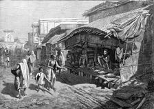 Native shop in Bazaar-Street, Calcutta, 1874. Creator: Unknown