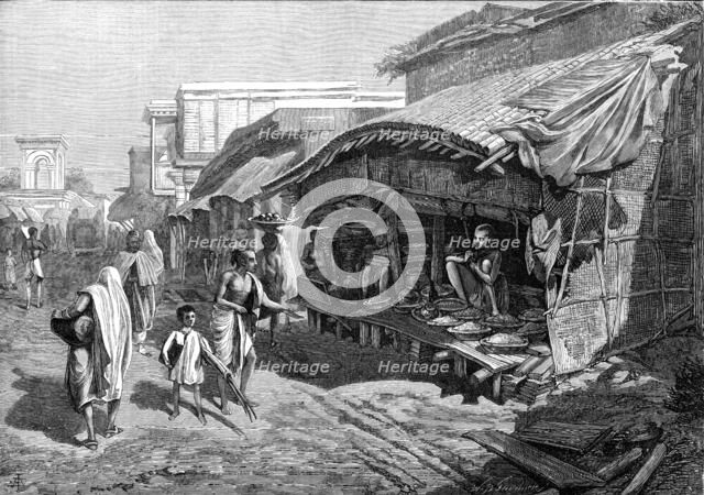 Native shop in Bazaar-Street, Calcutta, 1874. Creator: Unknown.