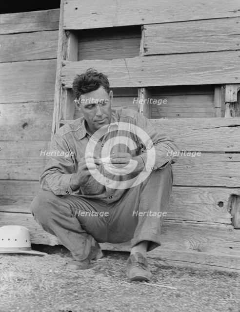 Native Texan farmer on relief, Goodliet, Hardeman County, Texas, 1938. Creator: Dorothea Lange.