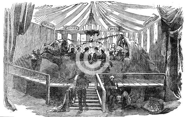Naturalists dining inside a model of a dinosaur, Crystal Palace, Sydenham, New Year's Eve, 1853. Artist: Unknown