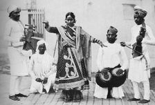 Nautch girl with musicians, 1902. Artist: Kapp & Co