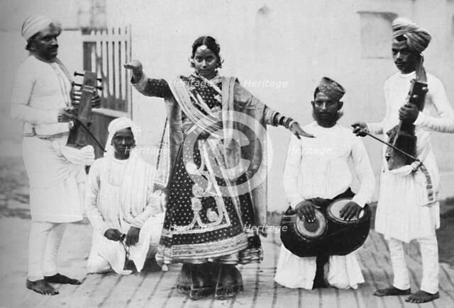 Nautch girl with musicians, 1902. Artist: Kapp & Co.