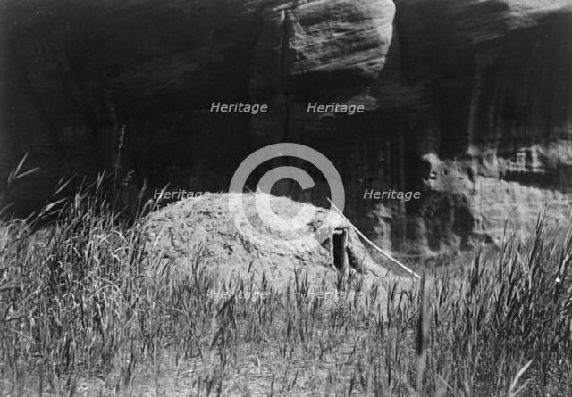 Navaho hogan in Cañon del Muerta, c1906. Creator: Edward Sheriff Curtis.