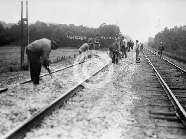 Navvies strengthen the railway between Stockholm and Malmö, Sweden, 1930s. Creator: Karl Sandels.