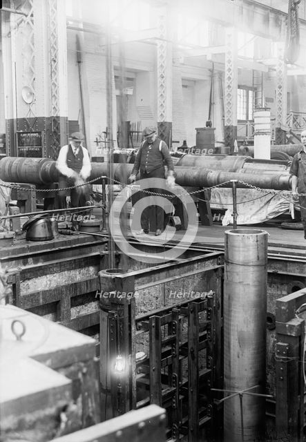 Navy Yard, U.S., Washington - 14 Inch Gun; Various Operations in Shrinking Jacket On It, 1917. Creator: Harris & Ewing.