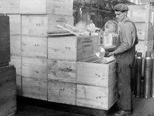 Navy Yard, U.S., Washington - Packing And Handling Cartridge Cases, 1917. Creator: Harris & Ewing