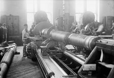Navy Yard, U.S., Washington - Turning, Examining And Boring A 5 Inch, 50 Cal. Gun, 1917. Creator: Harris & Ewing