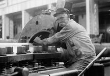 Navy Yard, U.S., Washington - Turning, Examining And Boring A 5 Inch, 50 Cal. Gun, 1917. Creator: Harris & Ewing