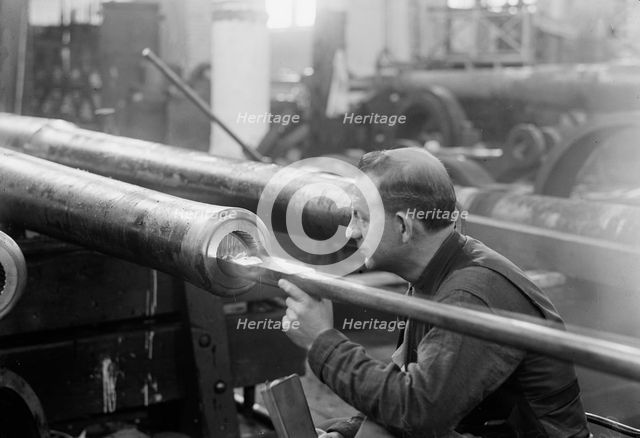 Navy Yard, U.S., Washington - Turning, Examining And Boring A 5 Inch, 50 Cal. Gun, 1917. Creator: Harris & Ewing.