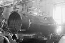 Navy Yard, U.S., Washington - 14 Inch Gun; Various Operations in Shrinking Jacket On It, 1917. Creator: Harris & Ewing