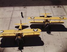 Navy N2S primary land planes at the naval Air Base, Corpus Christi, Texas, 1942. Creator: Howard Hollem