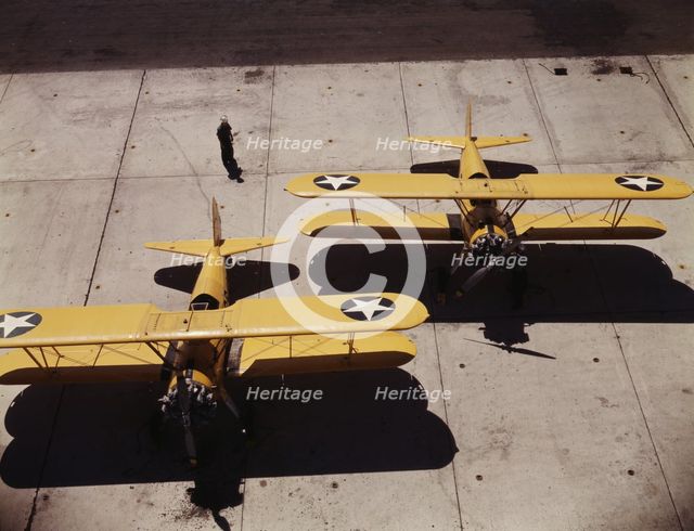Navy N2S primary land planes at the naval Air Base, Corpus Christi, Texas, 1942. Creator: Howard Hollem.