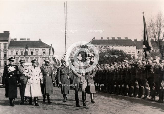 Nazi Deputy Führer Rudolf Hess on an official visit to Vienna, April 1938. Artist: Unknown
