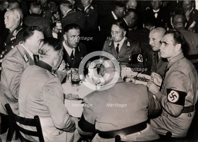 Nazi Deputy Leader Rudolf Hess with party colleagues, Bürgerbräukeller, Munich, October 1937. Artist: Unknown